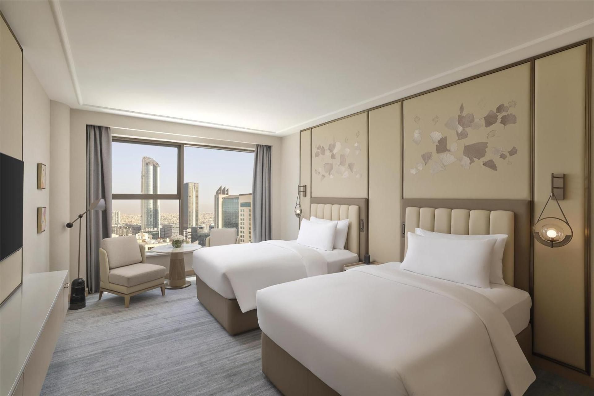 Signia by Hilton Amman Two Double Beds Deluxe Room