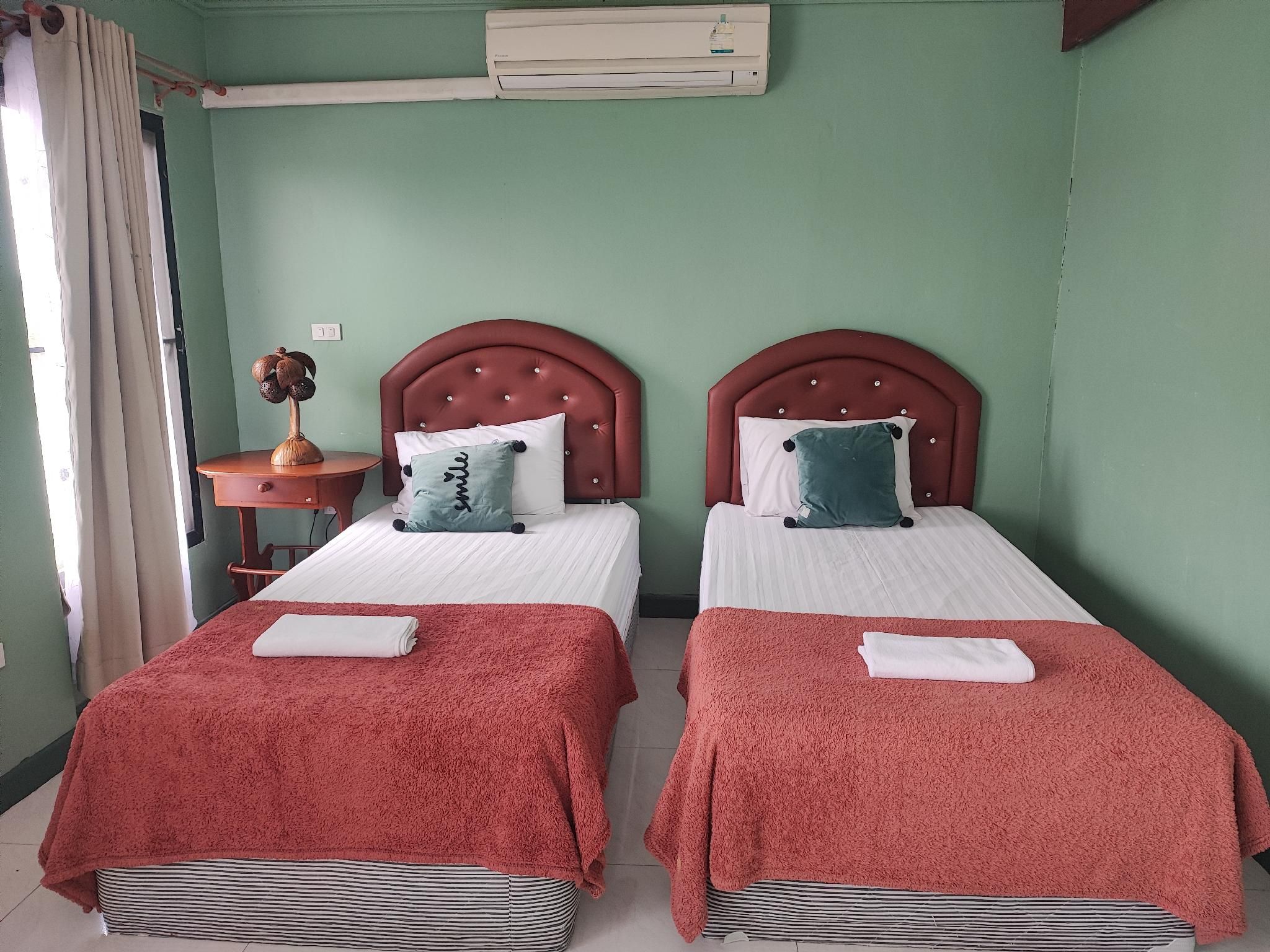 Rak Bua Hotel Twin Beds Standard Garden View High Floor 2