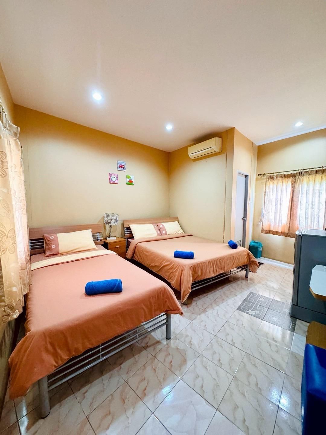 Triple Bed Room (1 Single bed and 1 Double bed)