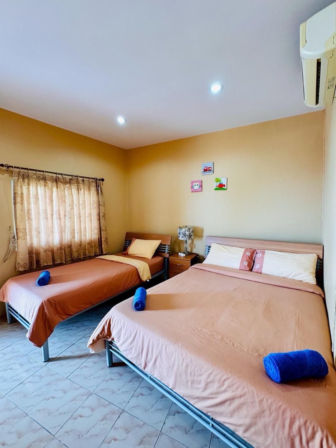 Triple Bed Room (1 Single bed and 1 Double bed)