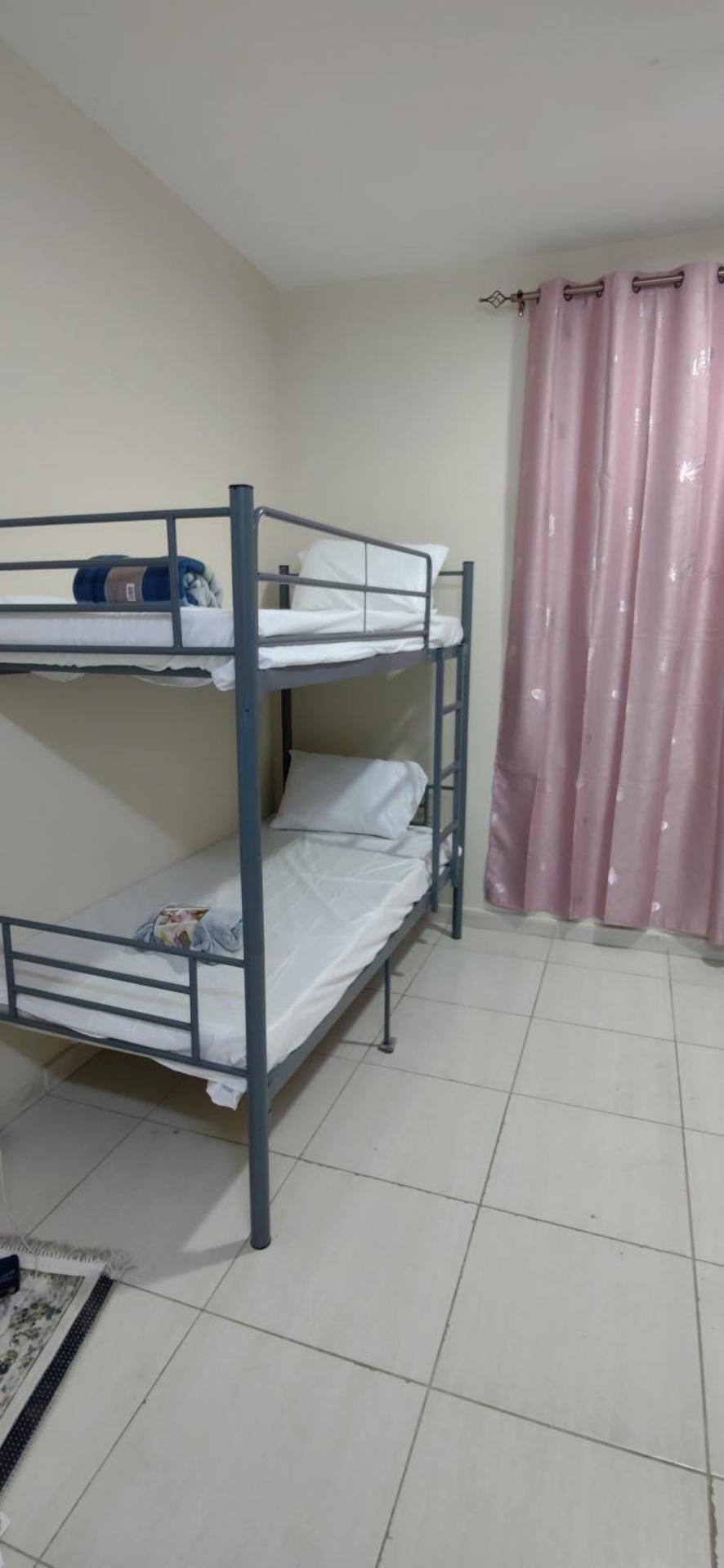 10-Bed Male Dormitory Room