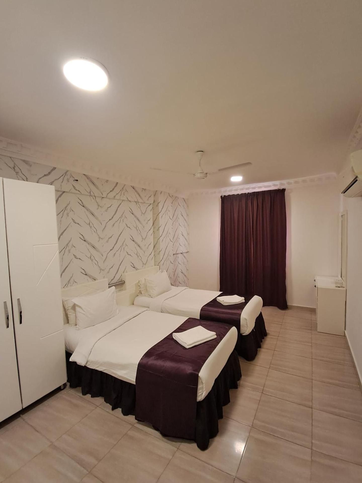 Economy Quadruple Room with Shared Bathroom