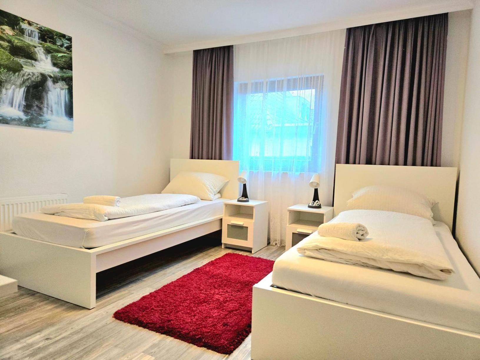 Four-Bedroom Apartment with Balcony 