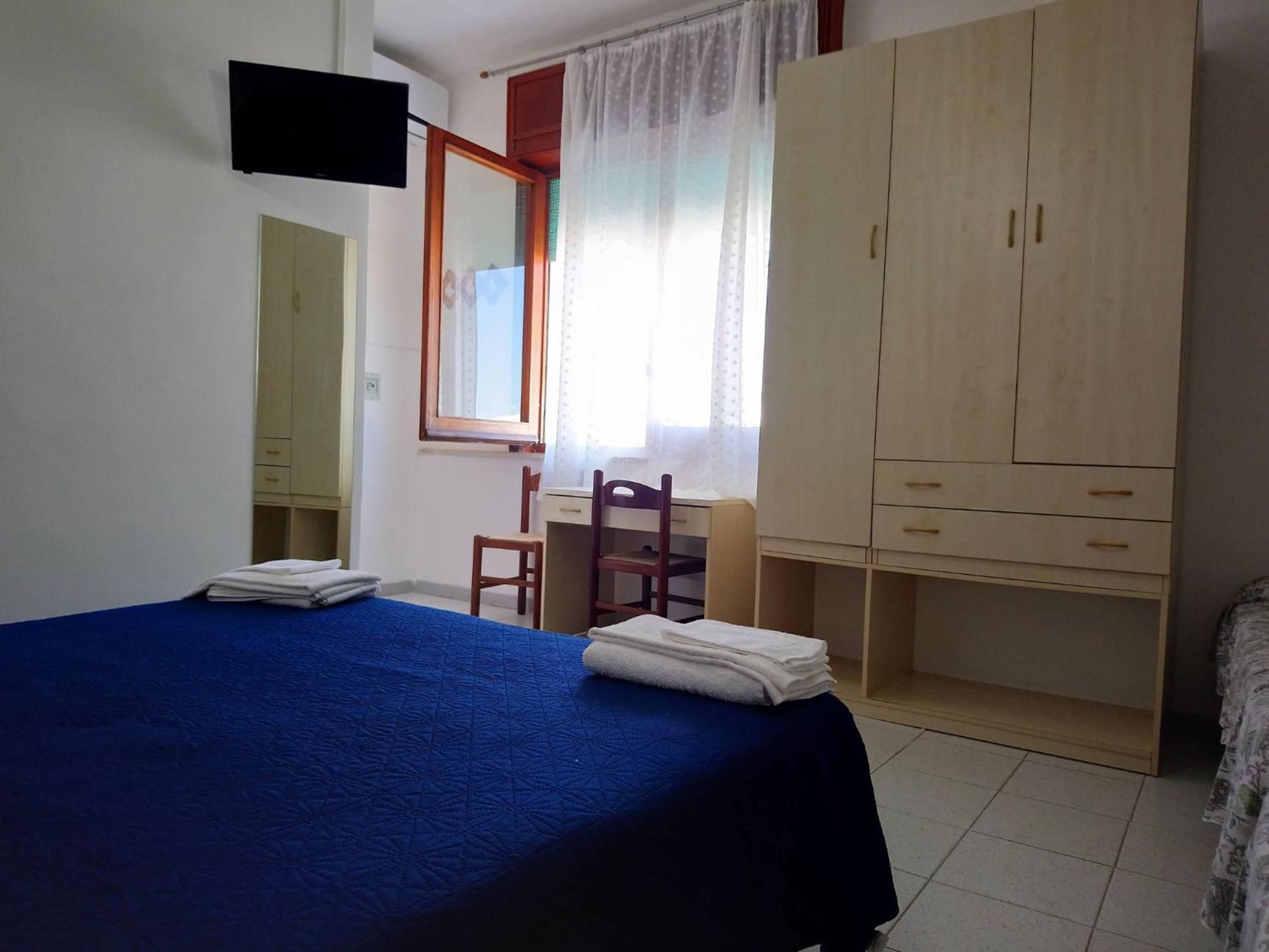 Quadruple Room with Private Bathroom
