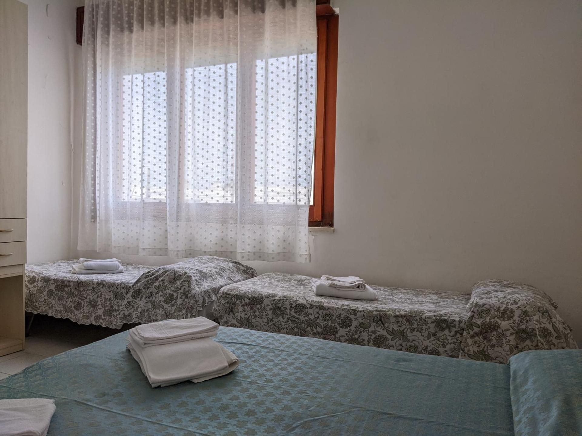 Quadruple Room with Private Bathroom