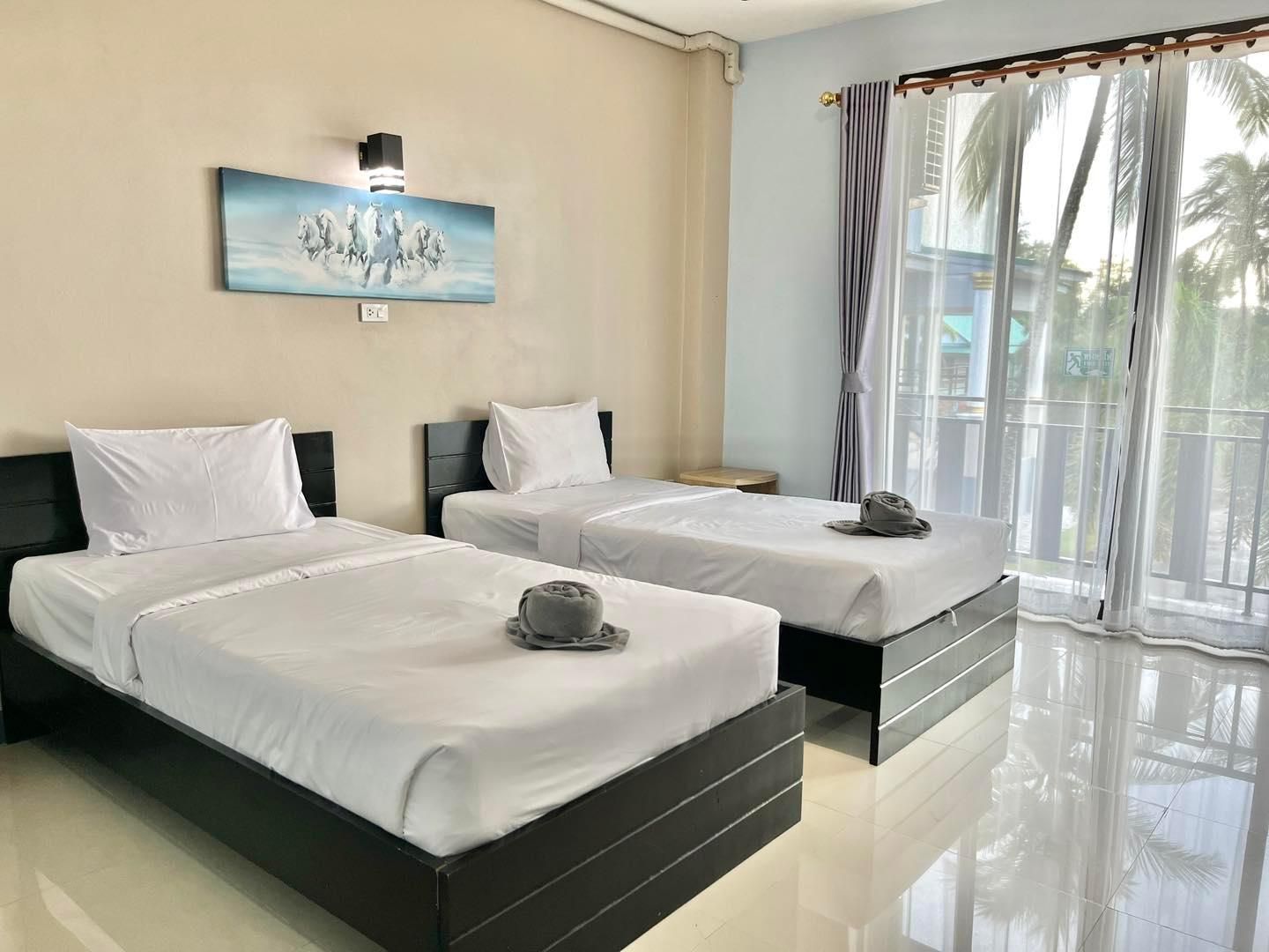 The Coco Grand Chalet Pakbara Standard Twin Room