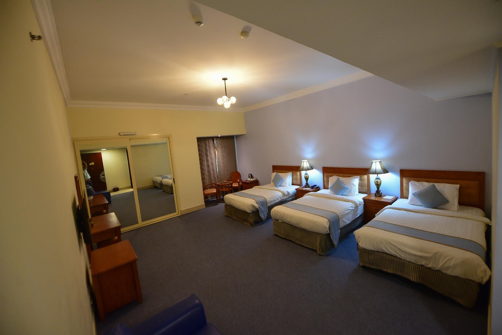 Deluxe Triple - 3 Single Beds