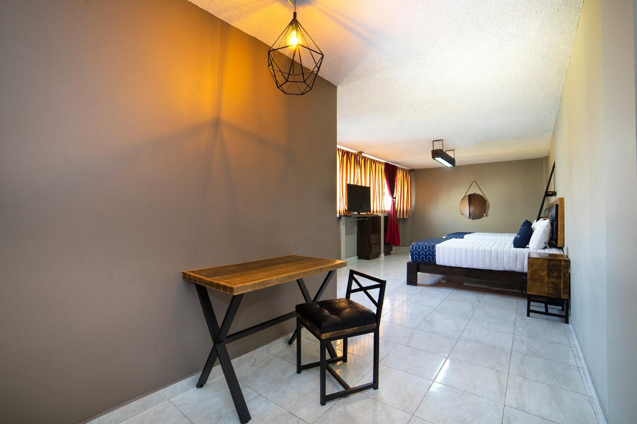 Capital O Hotel Diez Standard Two Beds