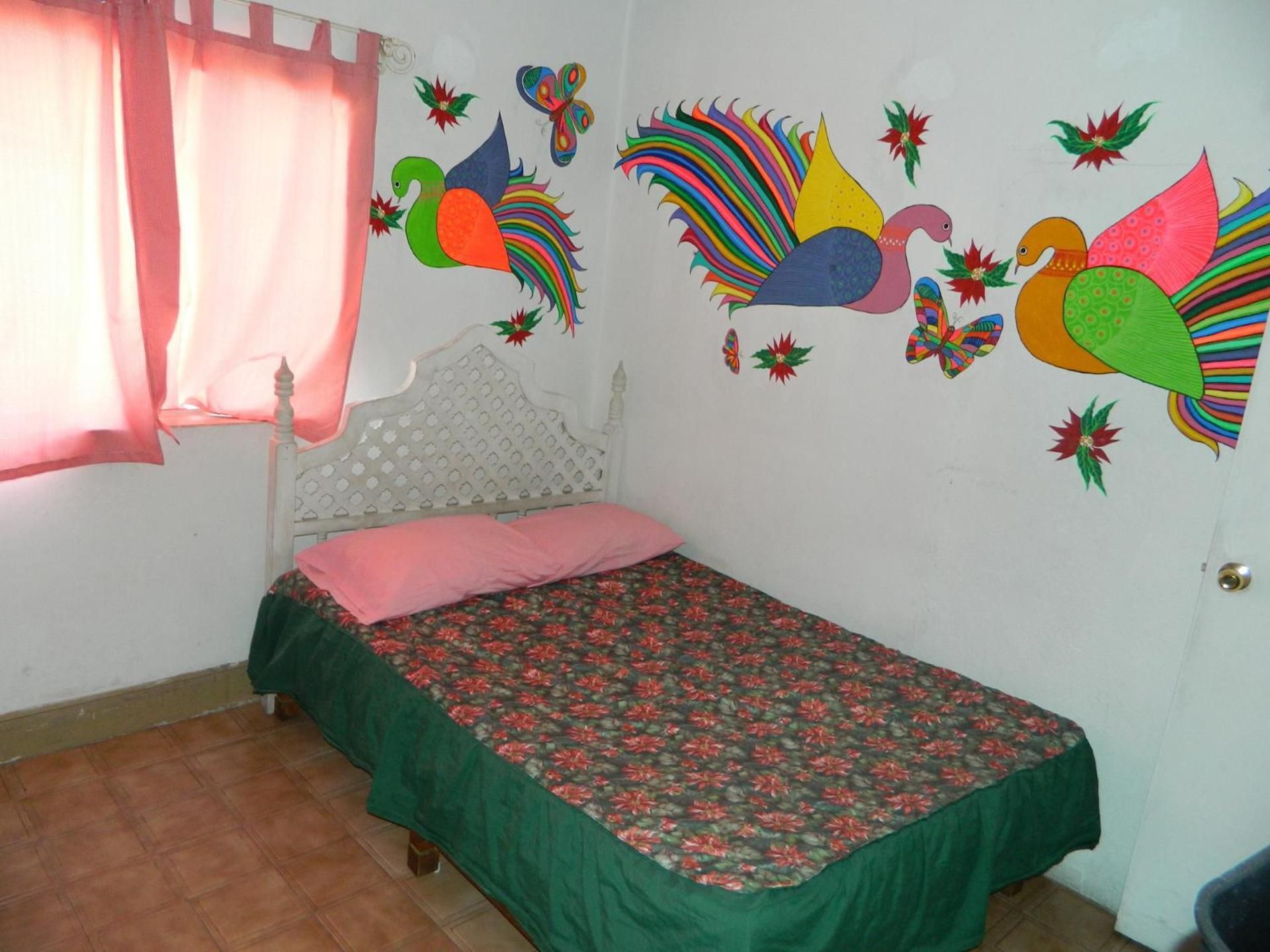 Economy Quadruple Room with Shared Bathroom