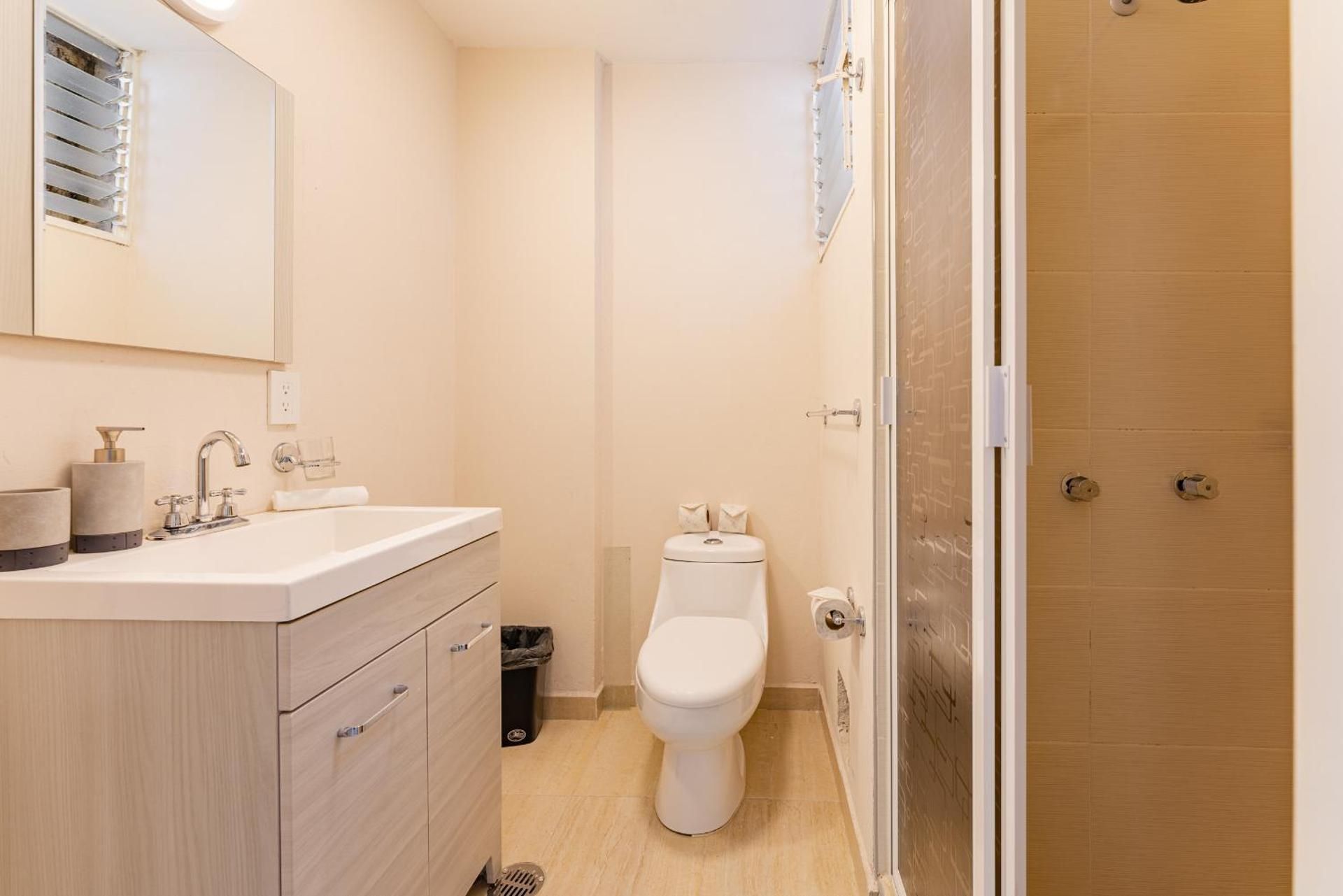 Four-Bedroom Apartment with Balcony 