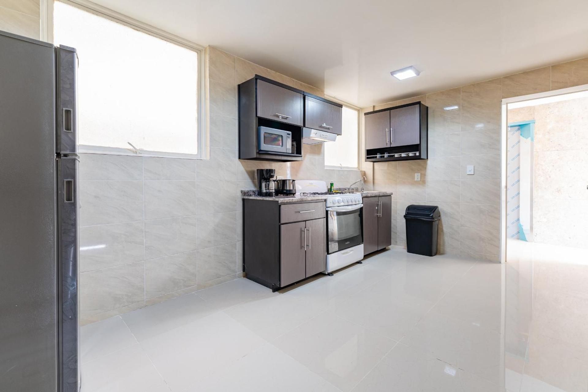 Four-Bedroom Apartment with Balcony 