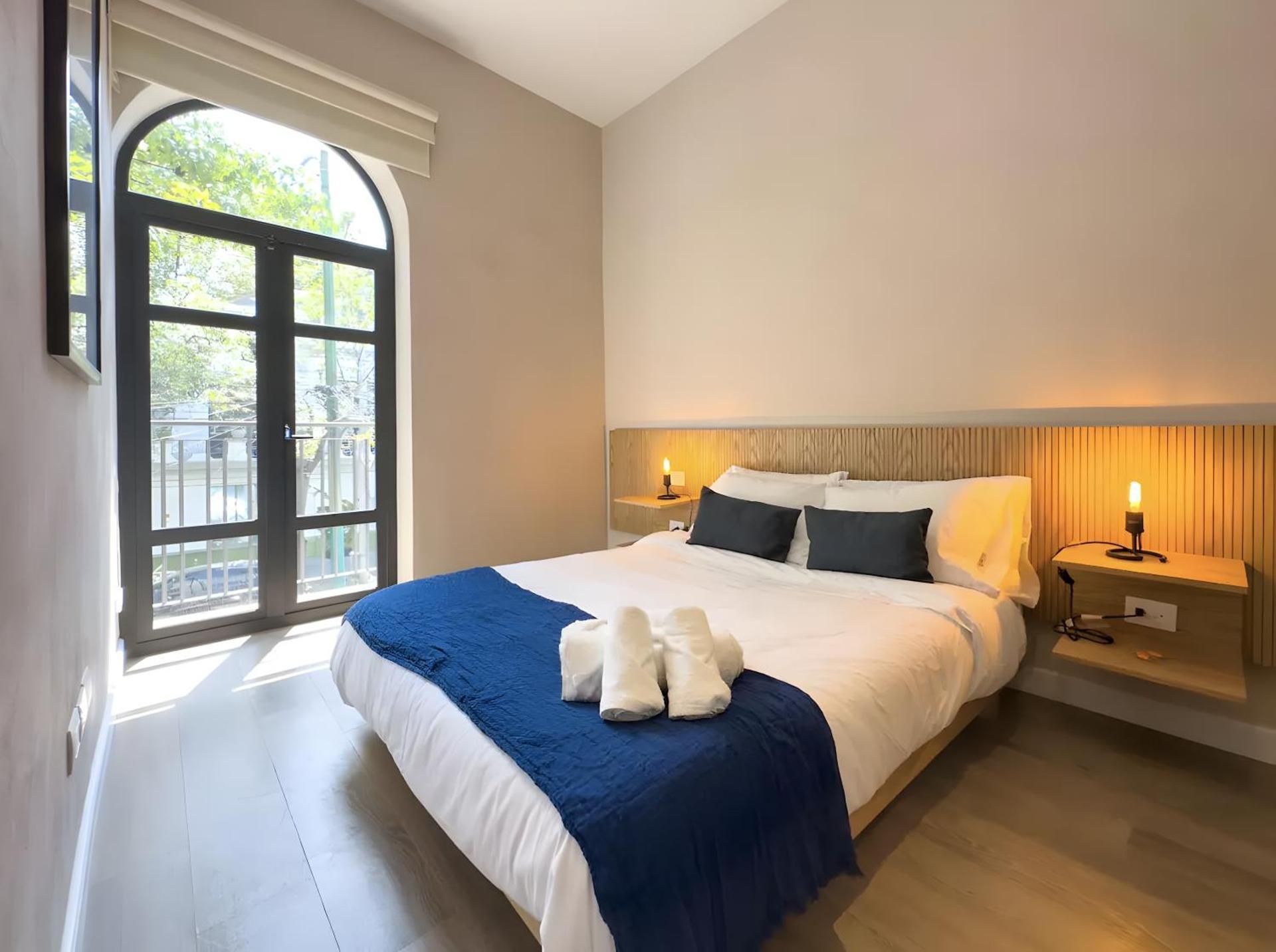 One-Bedroom Apartment with Balcony and City View