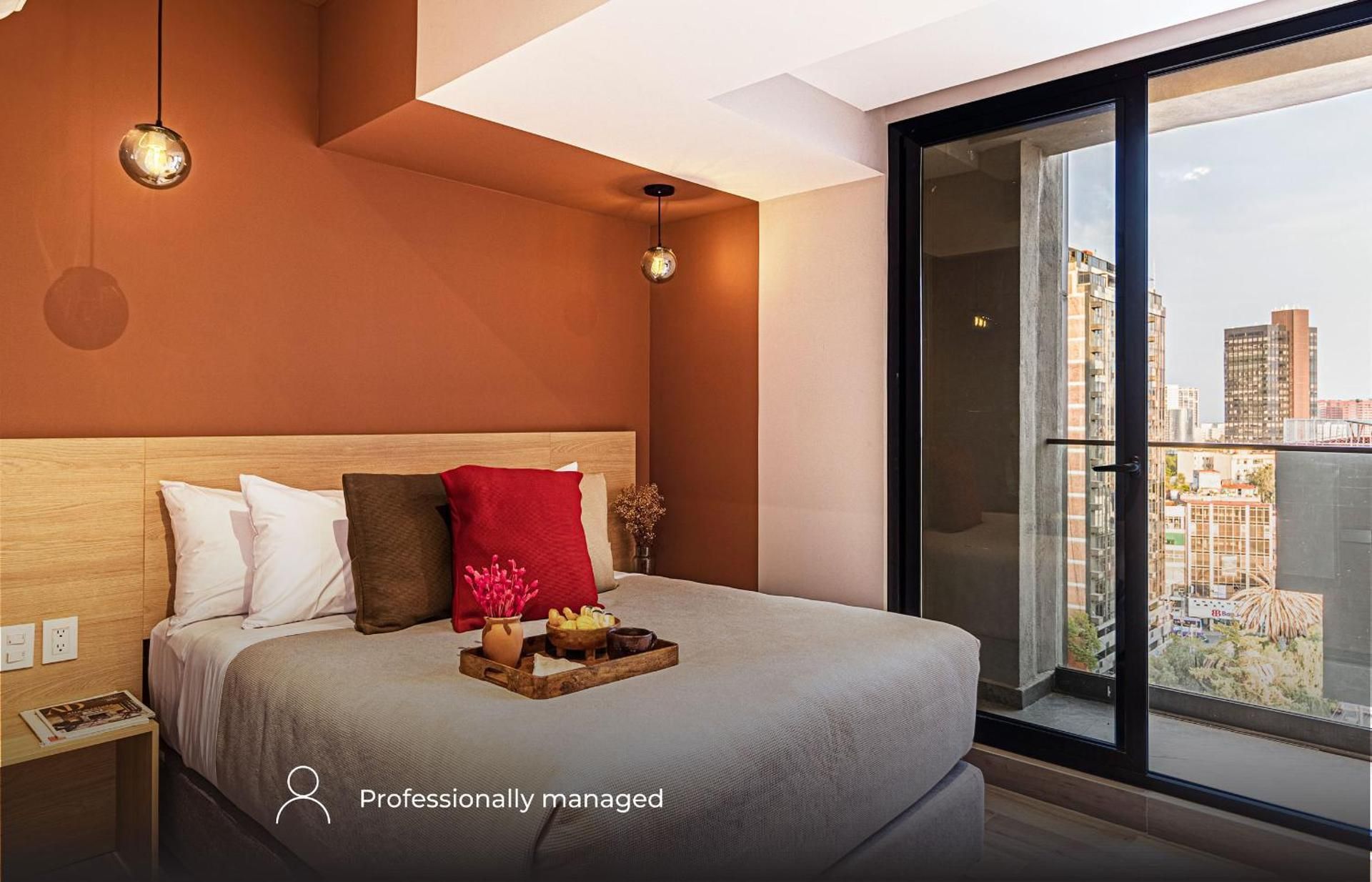 One-Bedroom Apartment with Balcony and City View