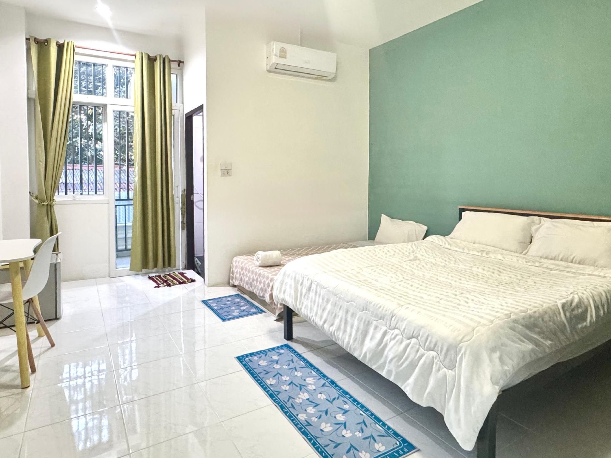 Triple Bed Room With Air Conditioning