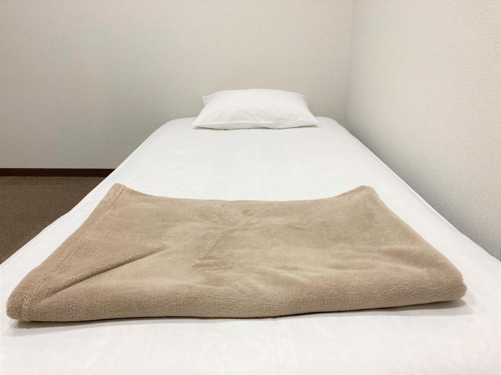 Single Room with Shared Shower and Toilet