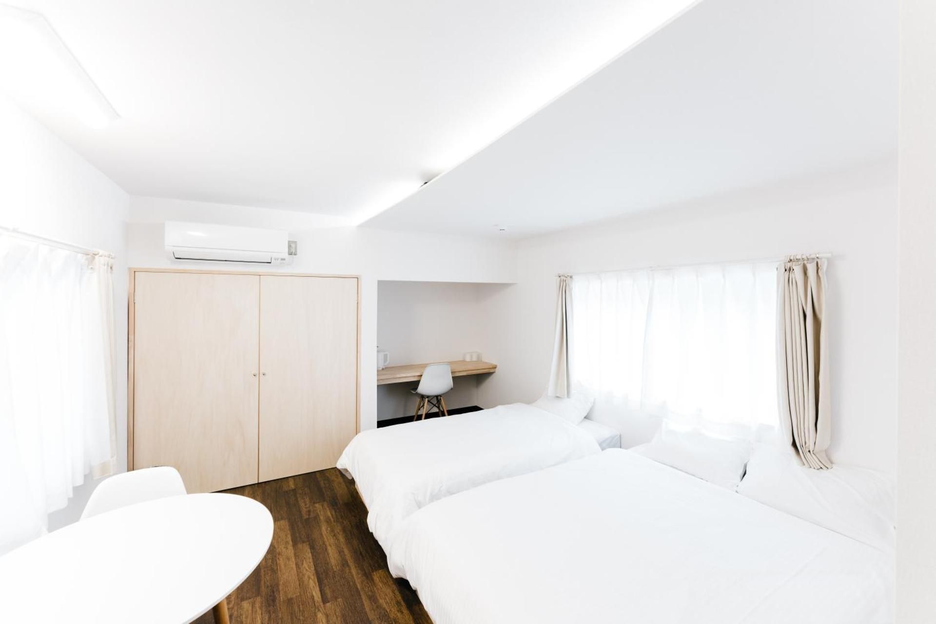 Deluxe Triple Room with Window and Balcony