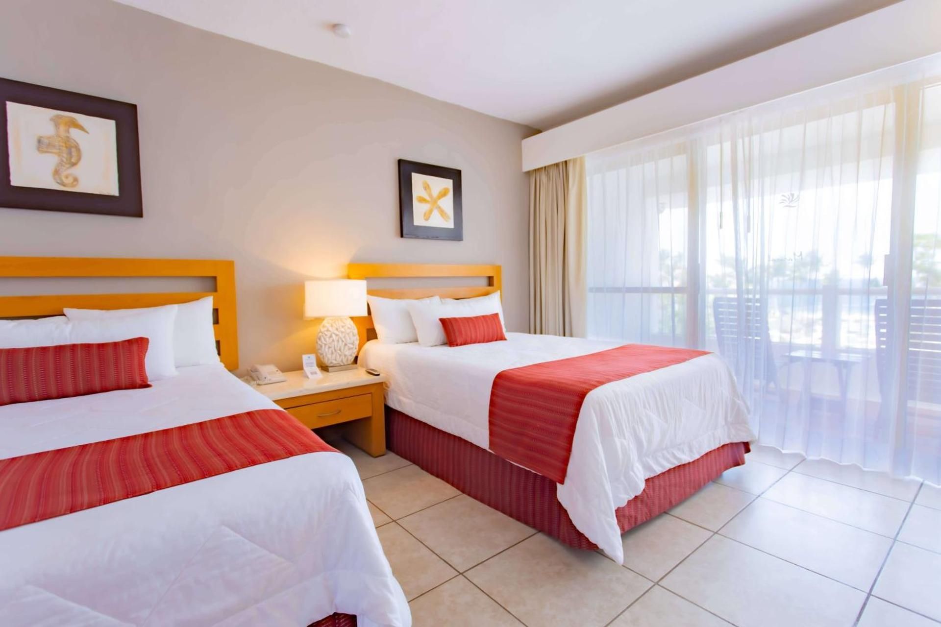 One-Bedroom Suite with Two Double Beds and Sofa Bed - Balcony or Terrace