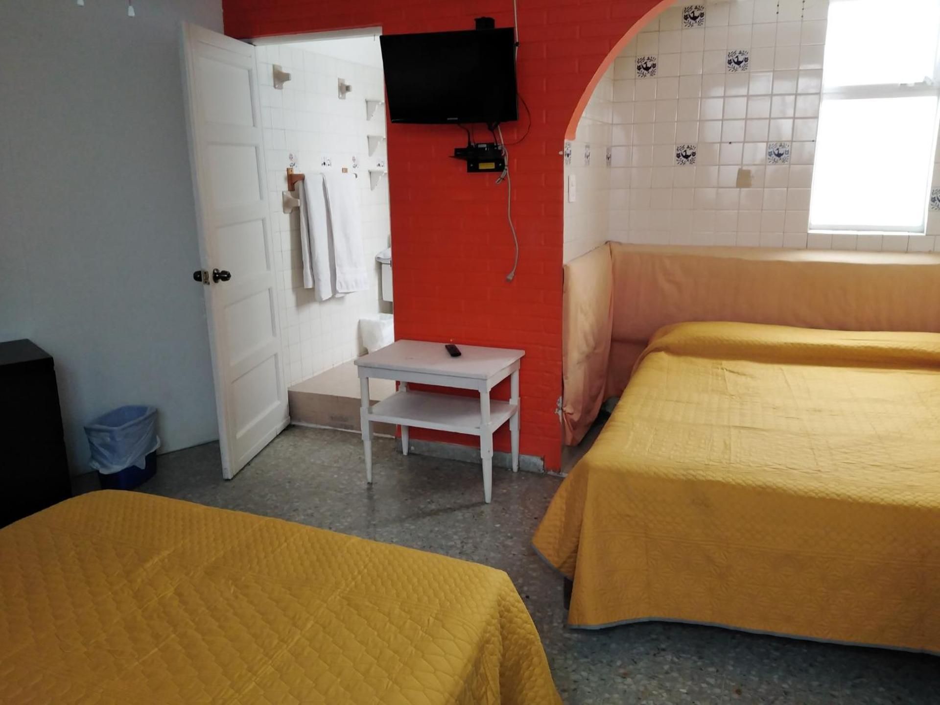 Quadruple Room with Private Bathroom
