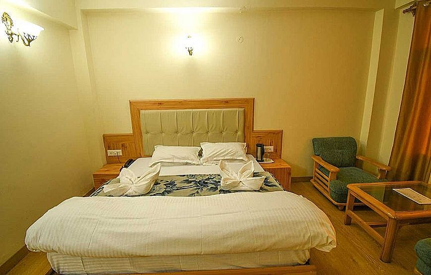 New Ambika International Deluxe Room 6