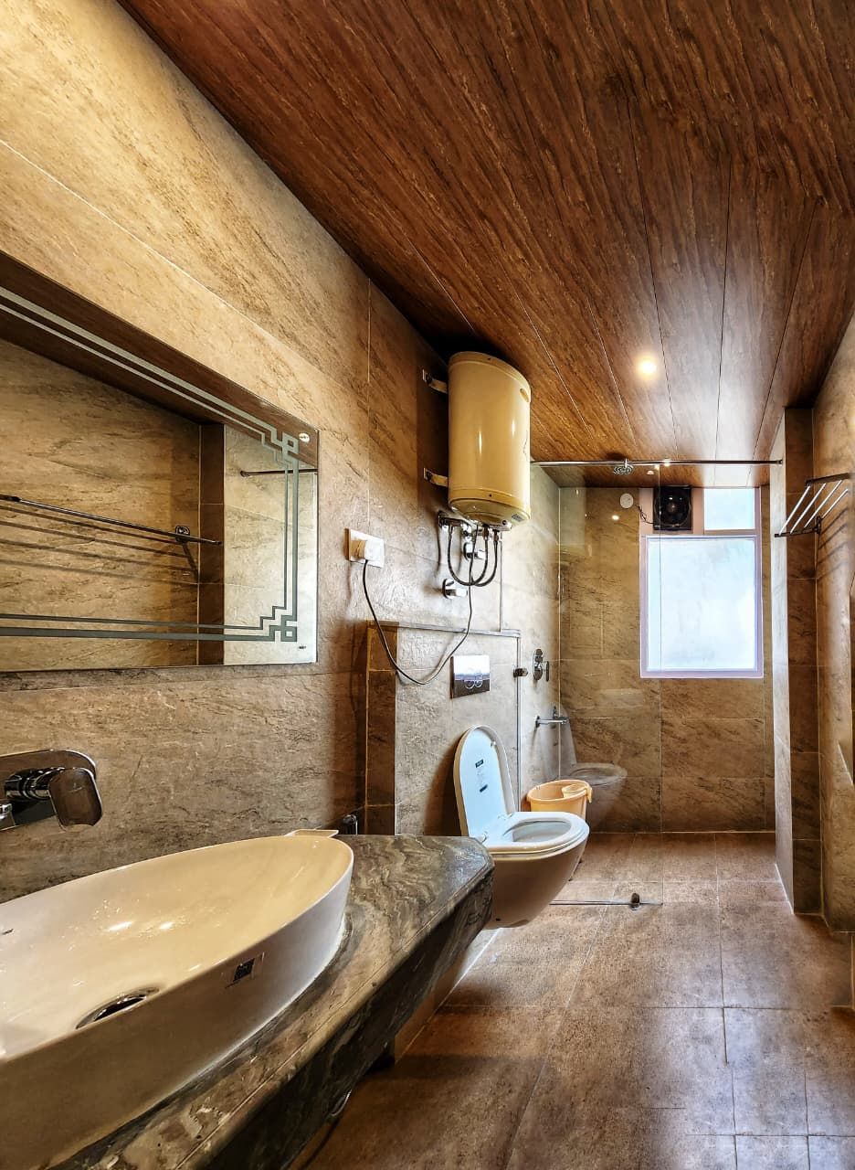 Super Deluxe Room with Balcony ( centrally Heated)