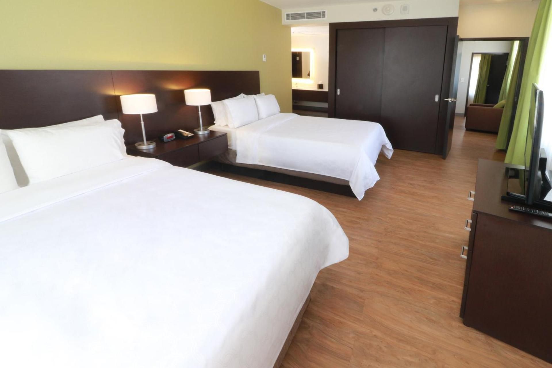 Two-Bedroom Suite with One Queen and Two Double Beds - Non-Smoking