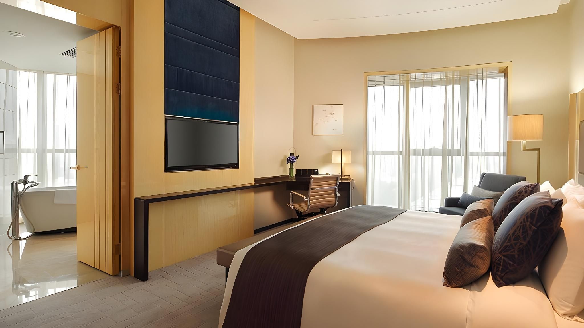 1 King 1 Bedroom Suite Living Area Bath View