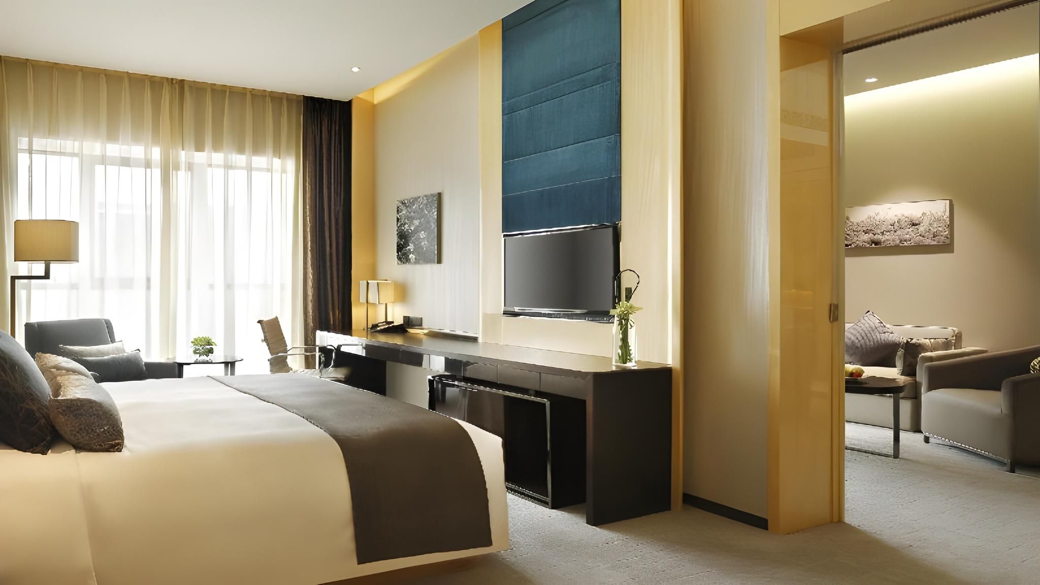 1 King 1 Bedroom Suite Living Area Bath View