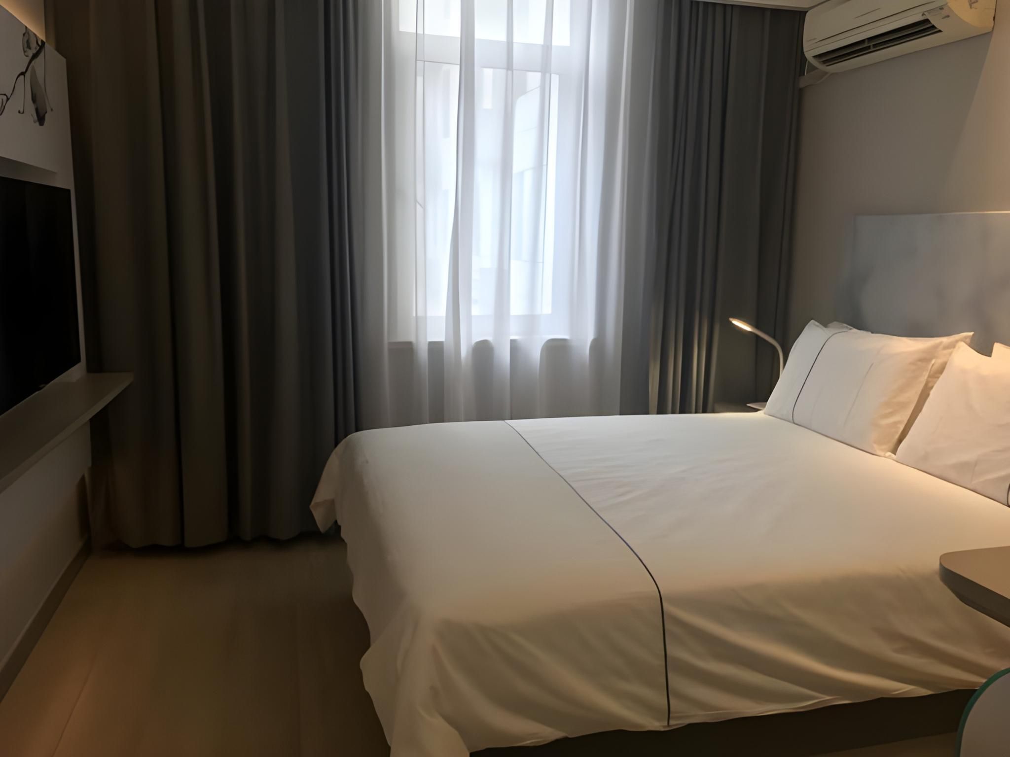 Magnotel - Yushu Bed Room