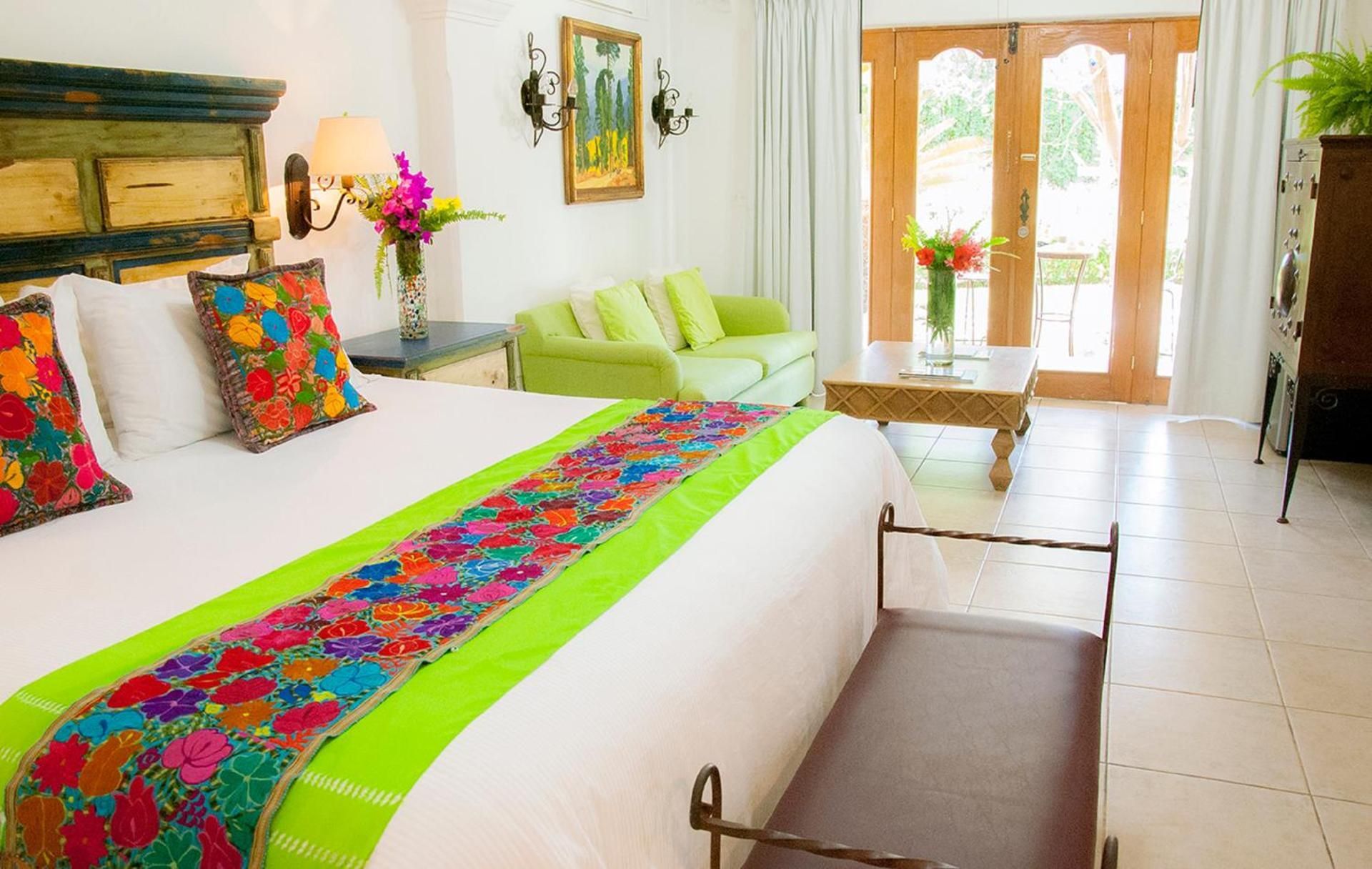 Suite with King Size Bed and Pool view at Main Building