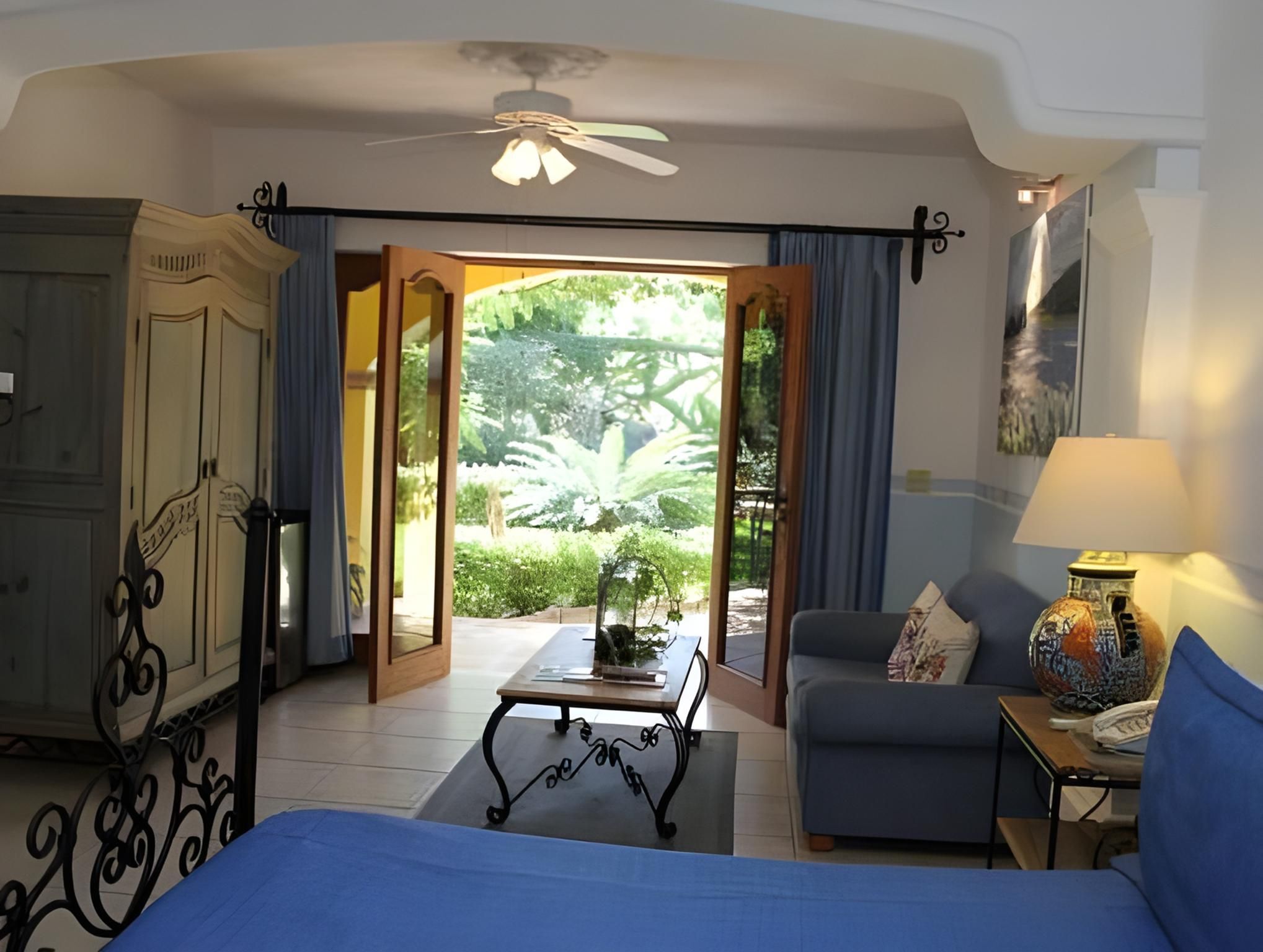 Suite with King Size Bed and Pool view at Main Building