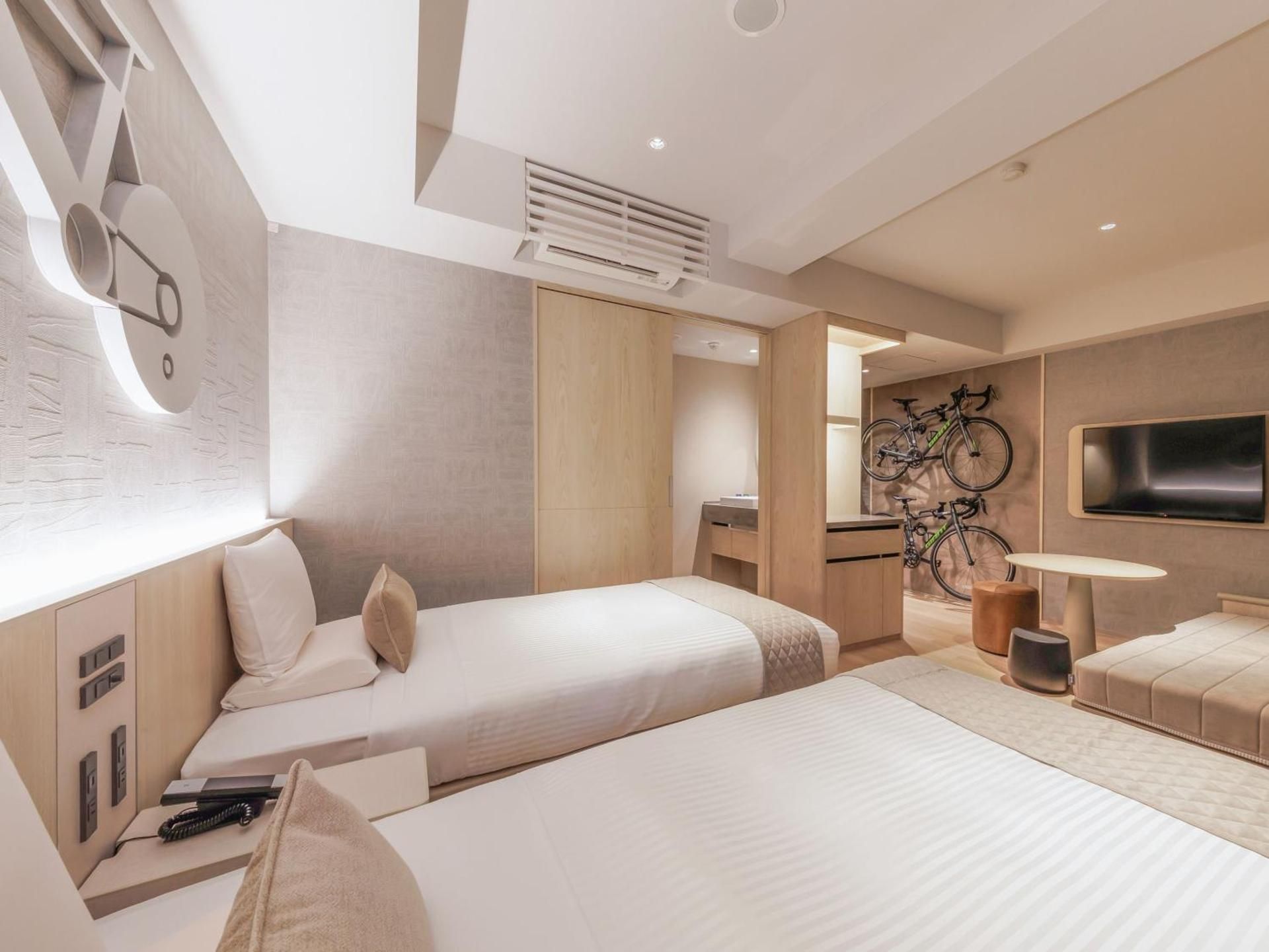 Superior Twin Bike Friendly Room With shower booth