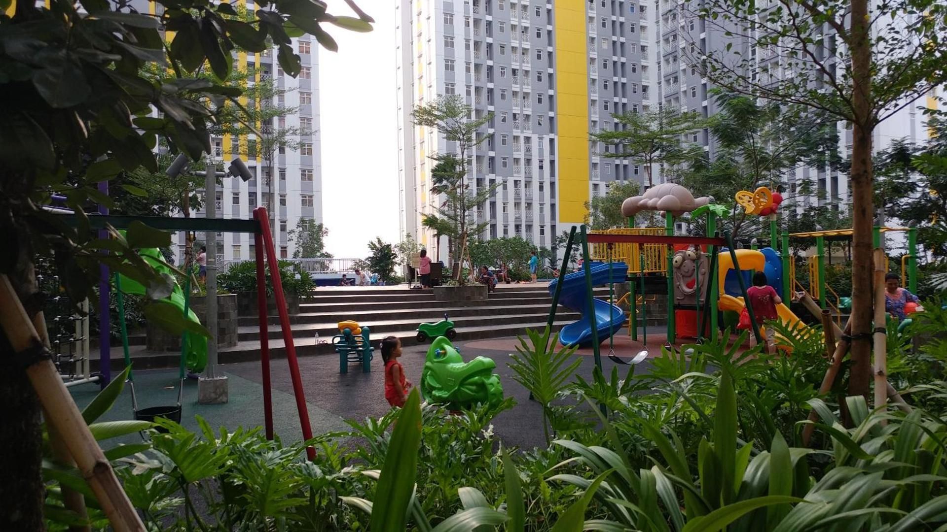 Homey 2BR Apt @ Springlake Summarecon By Travelio