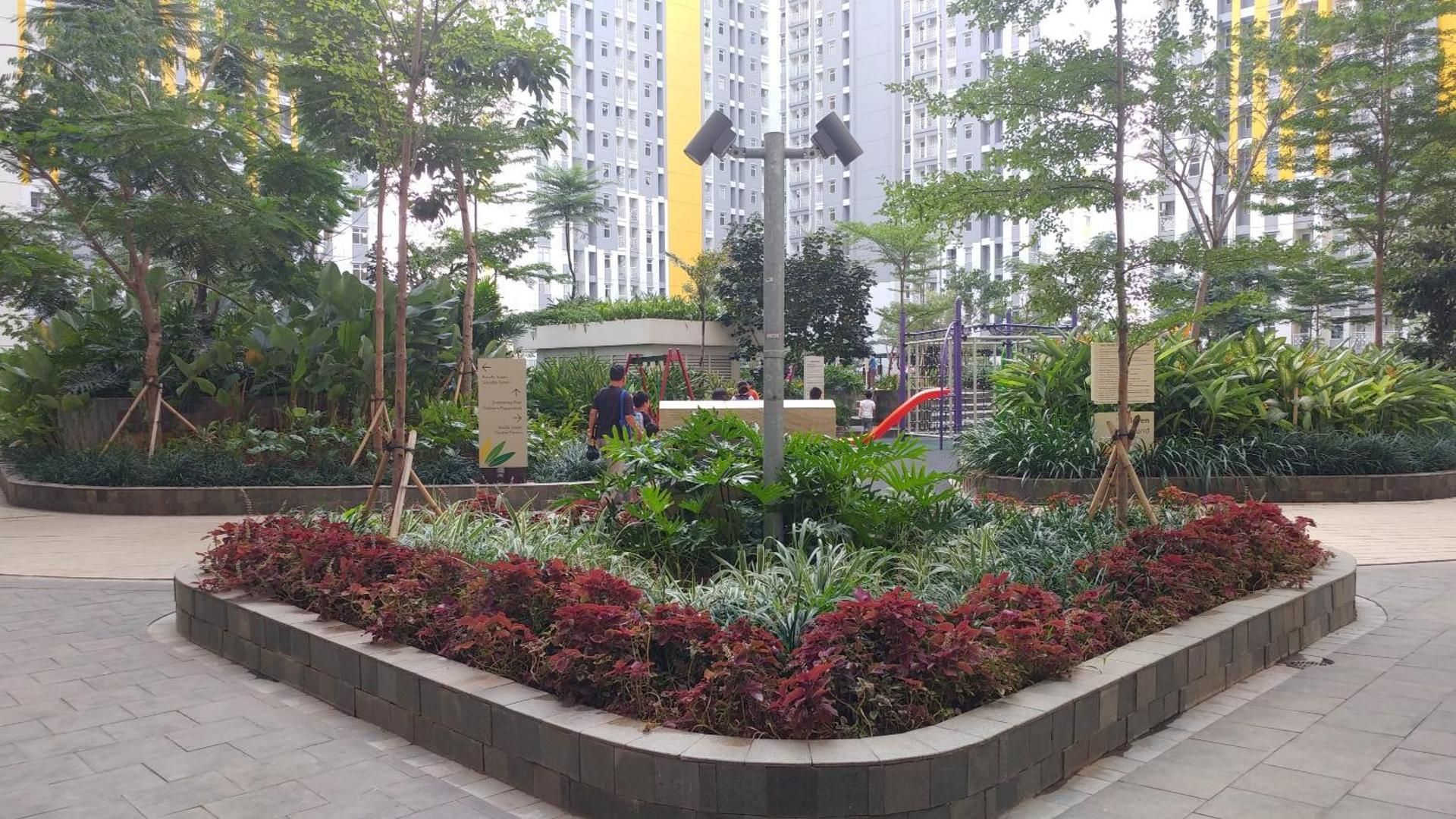 Homey 2BR Apt @ Springlake Summarecon By Travelio