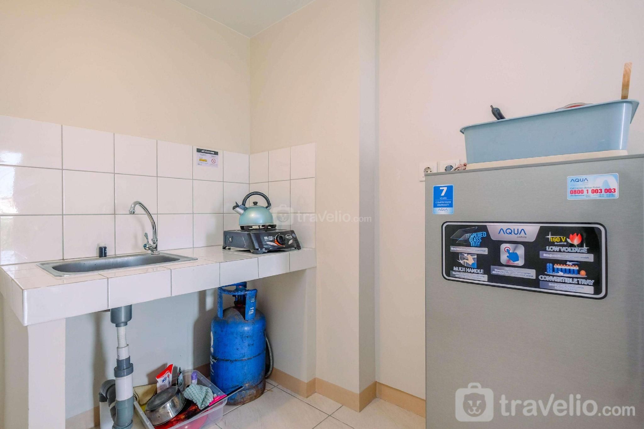Homey 2BR Apt @ Springlake Summarecon By Travelio