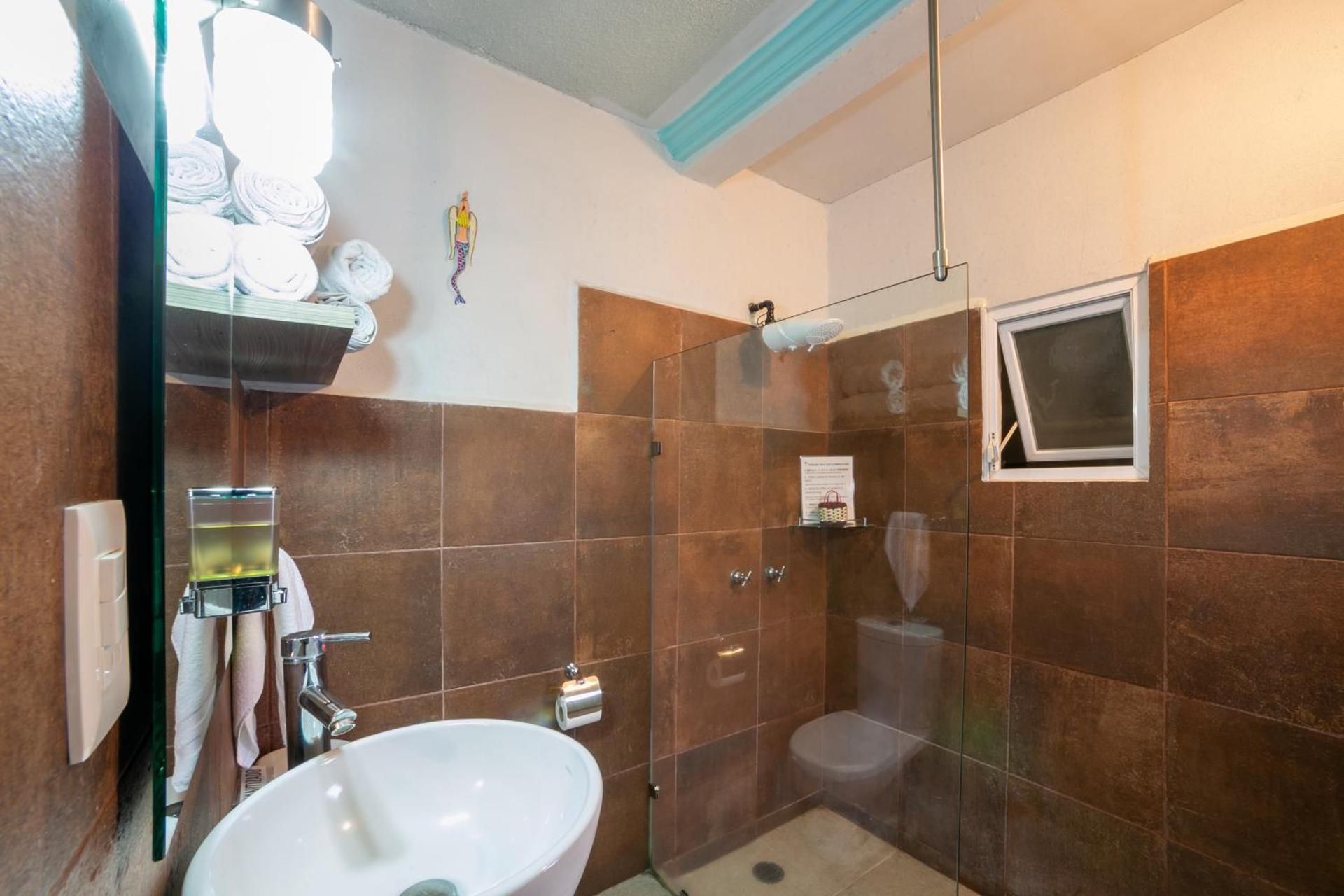 Quadruple Room with Private Bathroom
