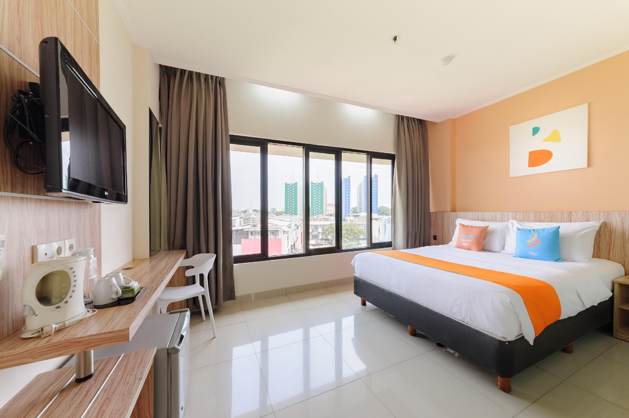 Sans Hotel The Green Bekasi by RedDoorz Deluxe Room