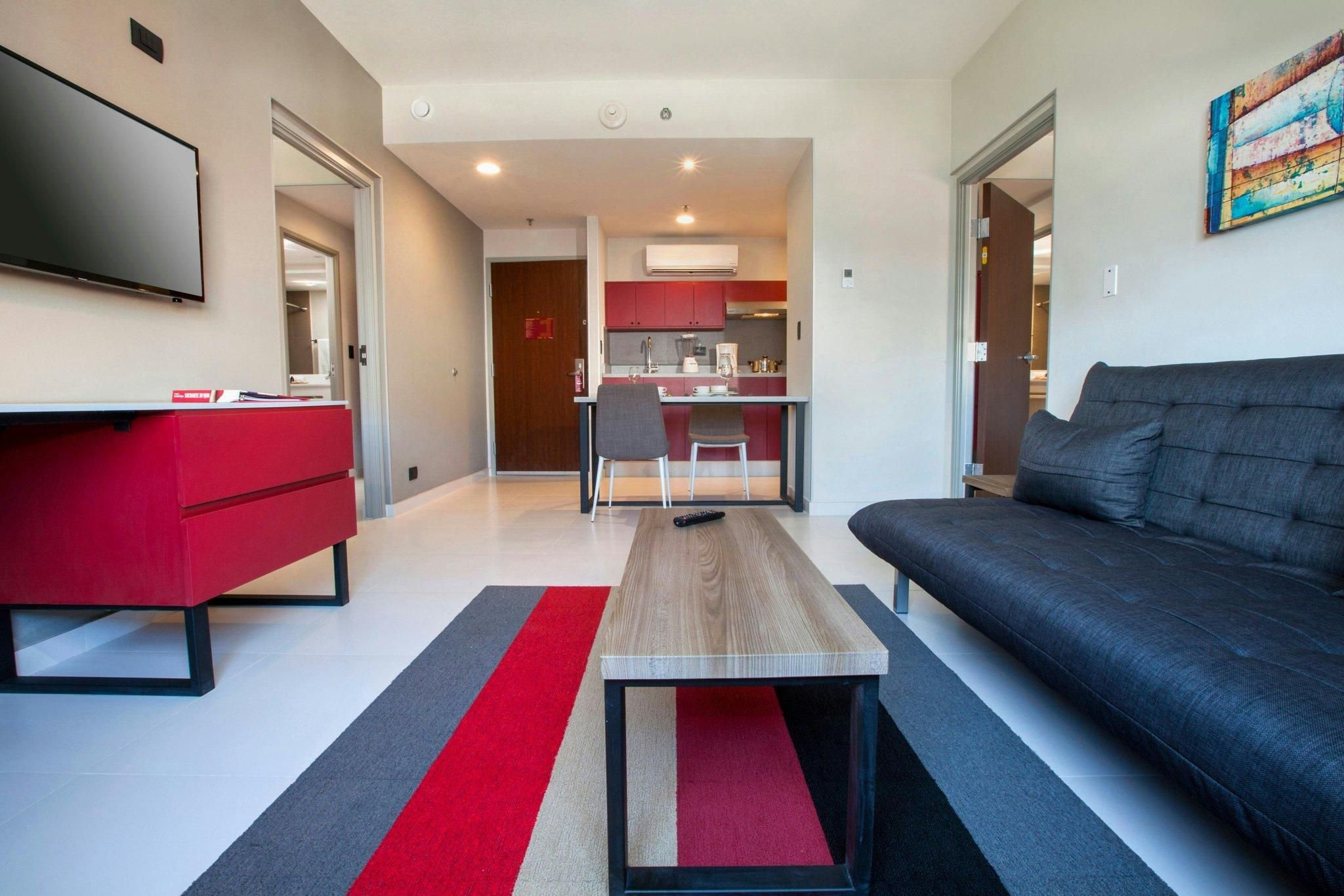 2 Bedroom Suite, Bedroom 1: 1 Queen, Bedroom 2: 2 Double, Sofa Bed