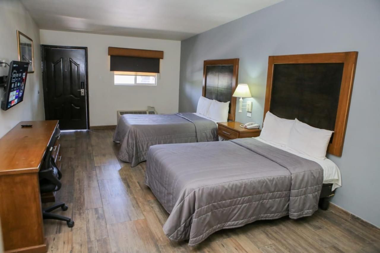 Double Room with Two double beds and Breakfast for two