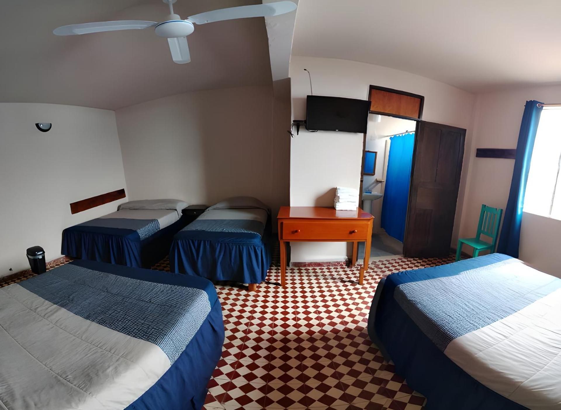 Quadruple Room with Private Bathroom