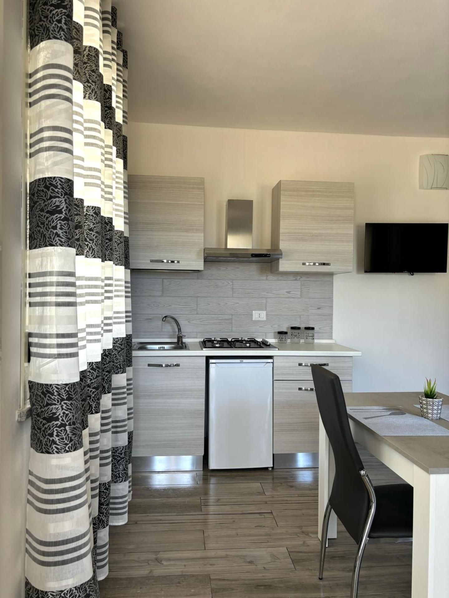 One-Bedroom Apartment with Balcony and Sea View