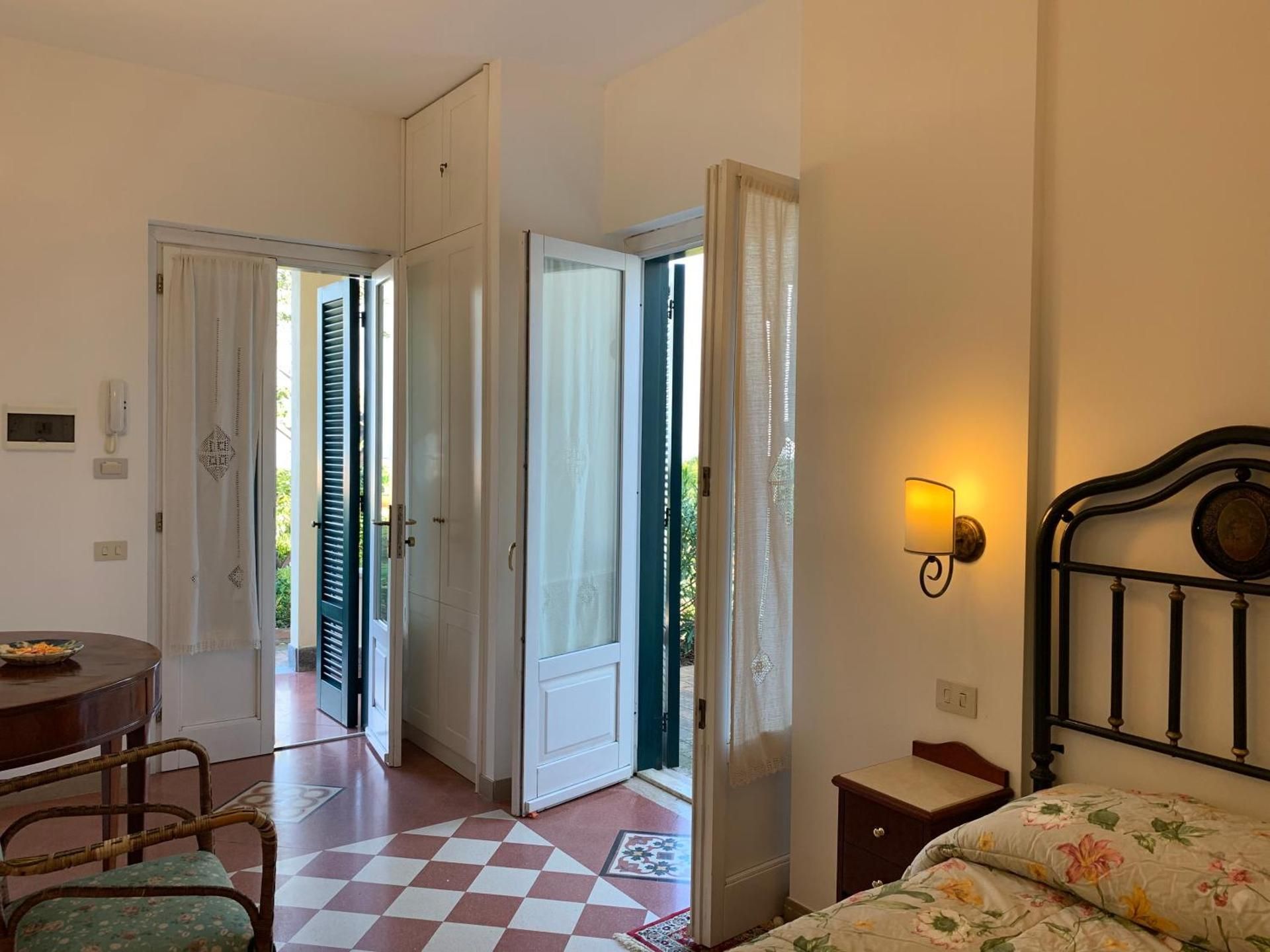 Superior Triple Room with Patio and Sea View