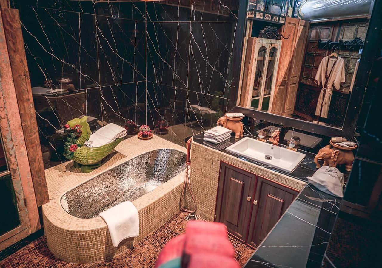 Lebak Suite with Signature Afternoon Tea, Mini-bar, and One Glass Afternoon Cocktail for Two People