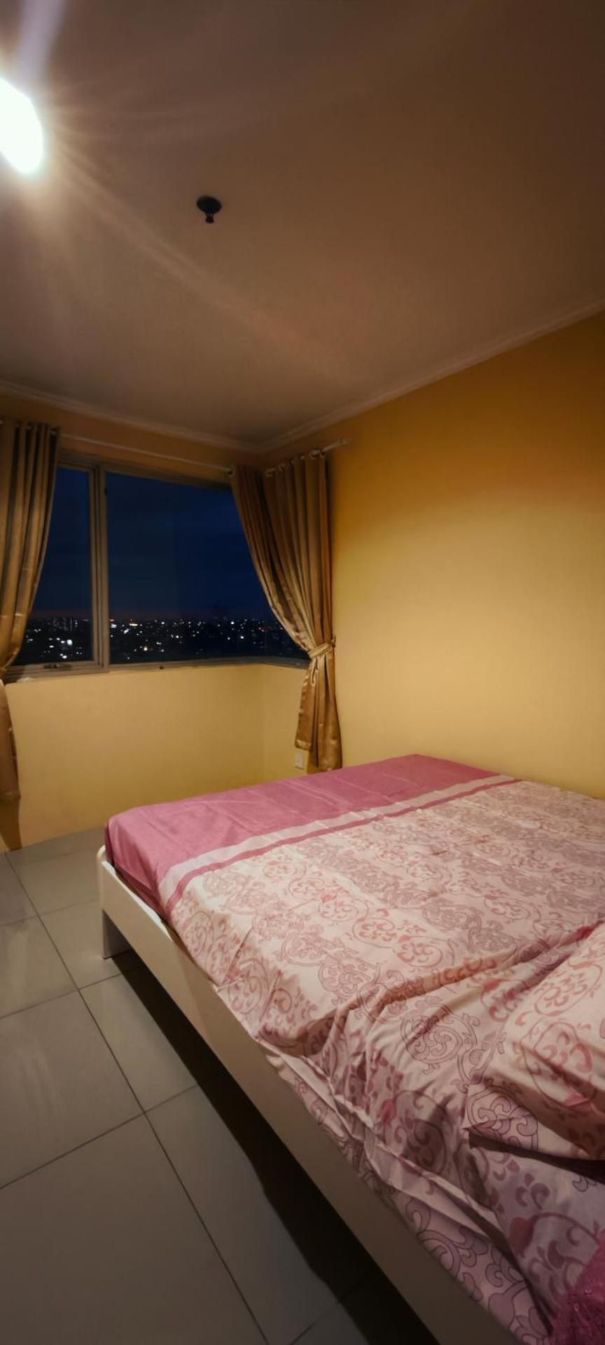 One-Bedroom Apartment with Balcony and City View