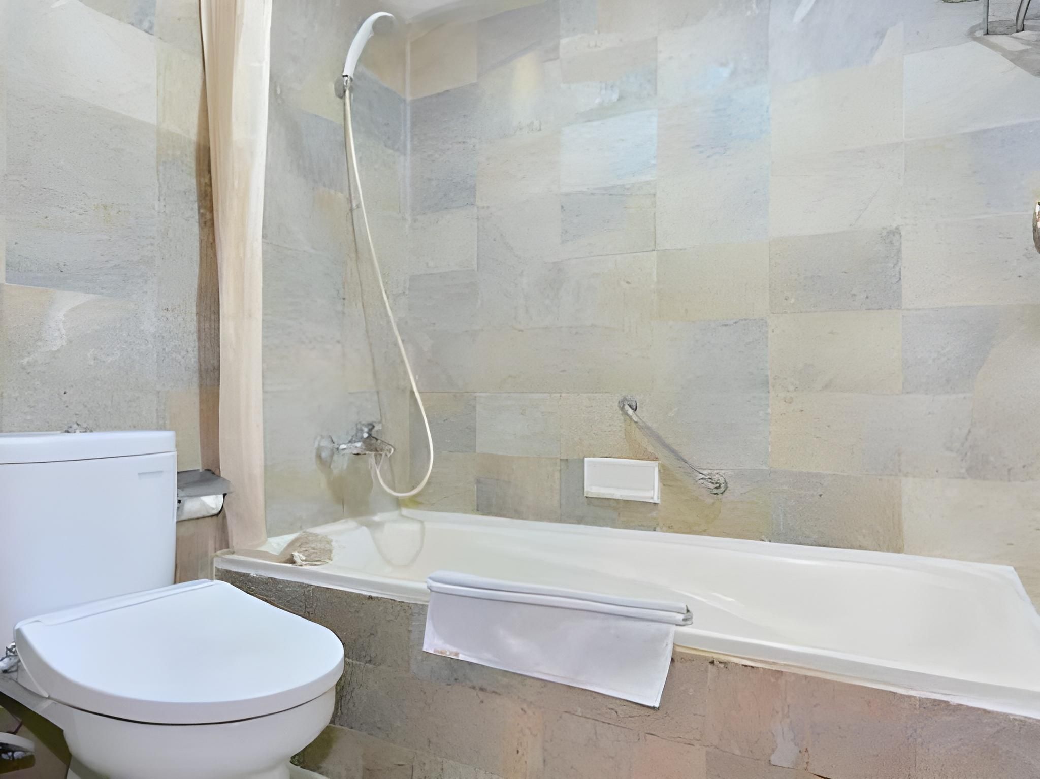 Puri Artha Hotel Deluxe Twin Room 2