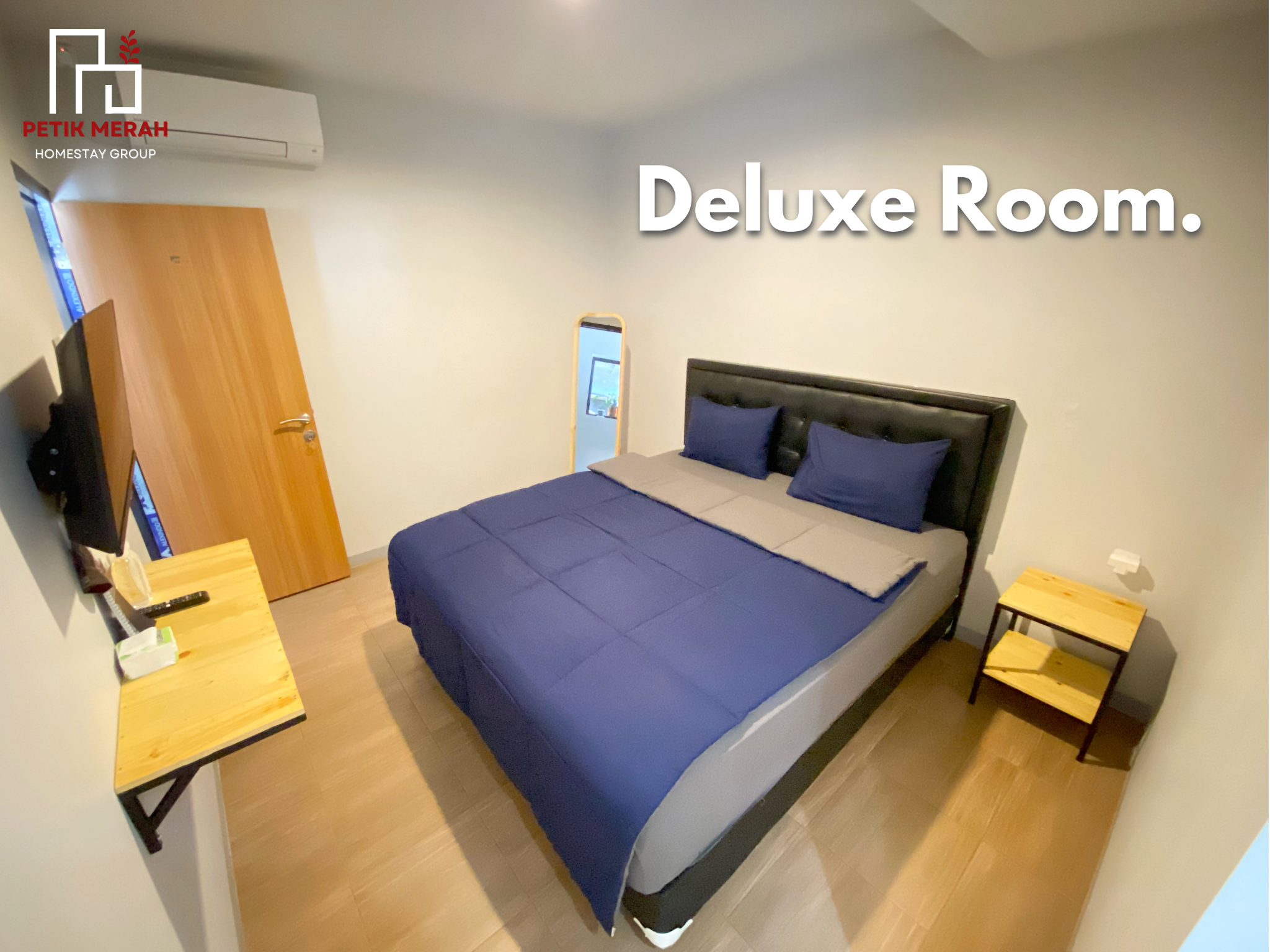 Deluxe - 1 Queen Bed