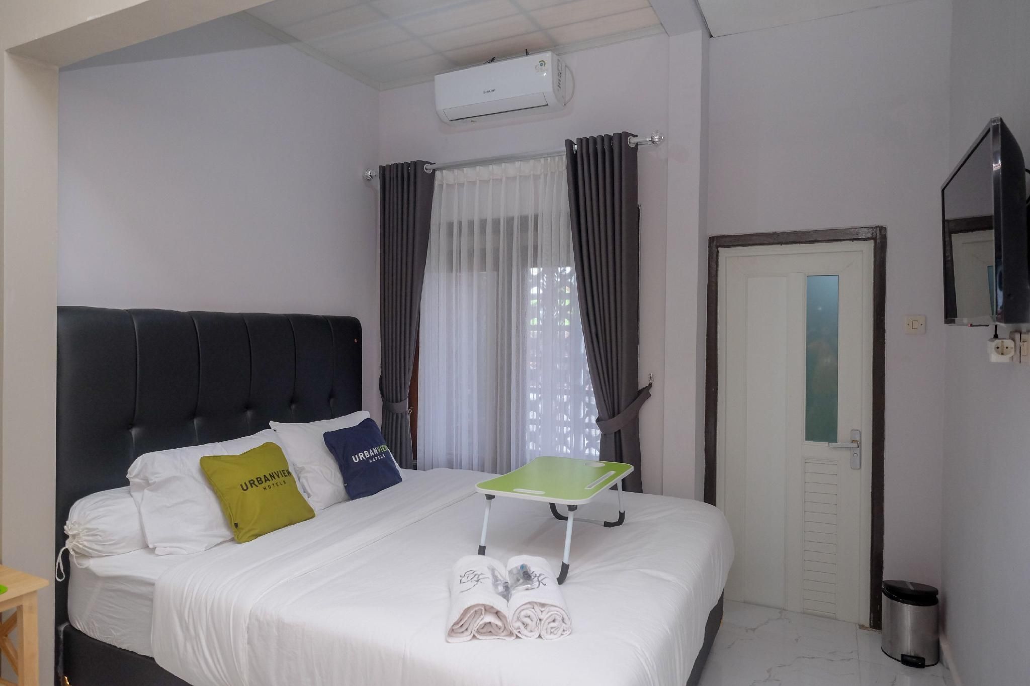 Urbanview Griya Jogokaryan by RedDoorz Deluxe Room 3