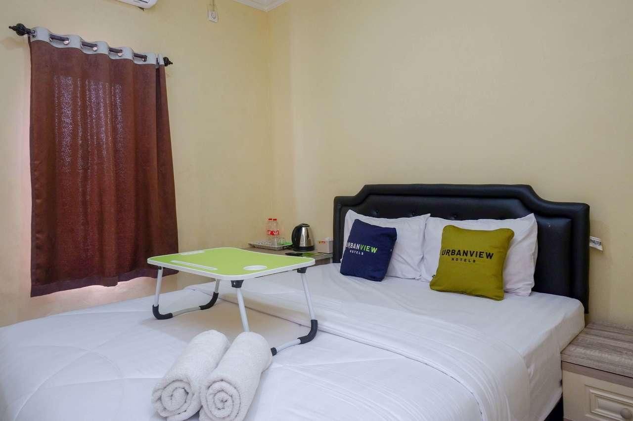 Urbanview Hotel Near Jogja City Mall Deluxe Room 2