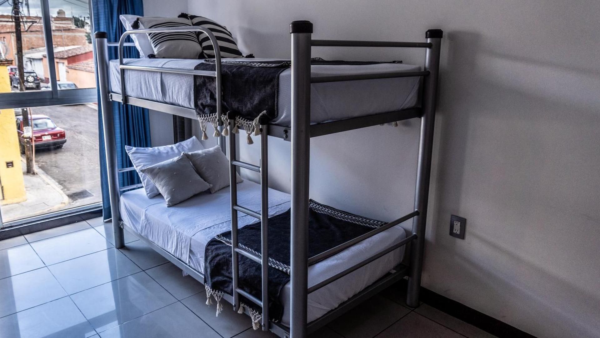 Single Bed in Male Dormitory Room