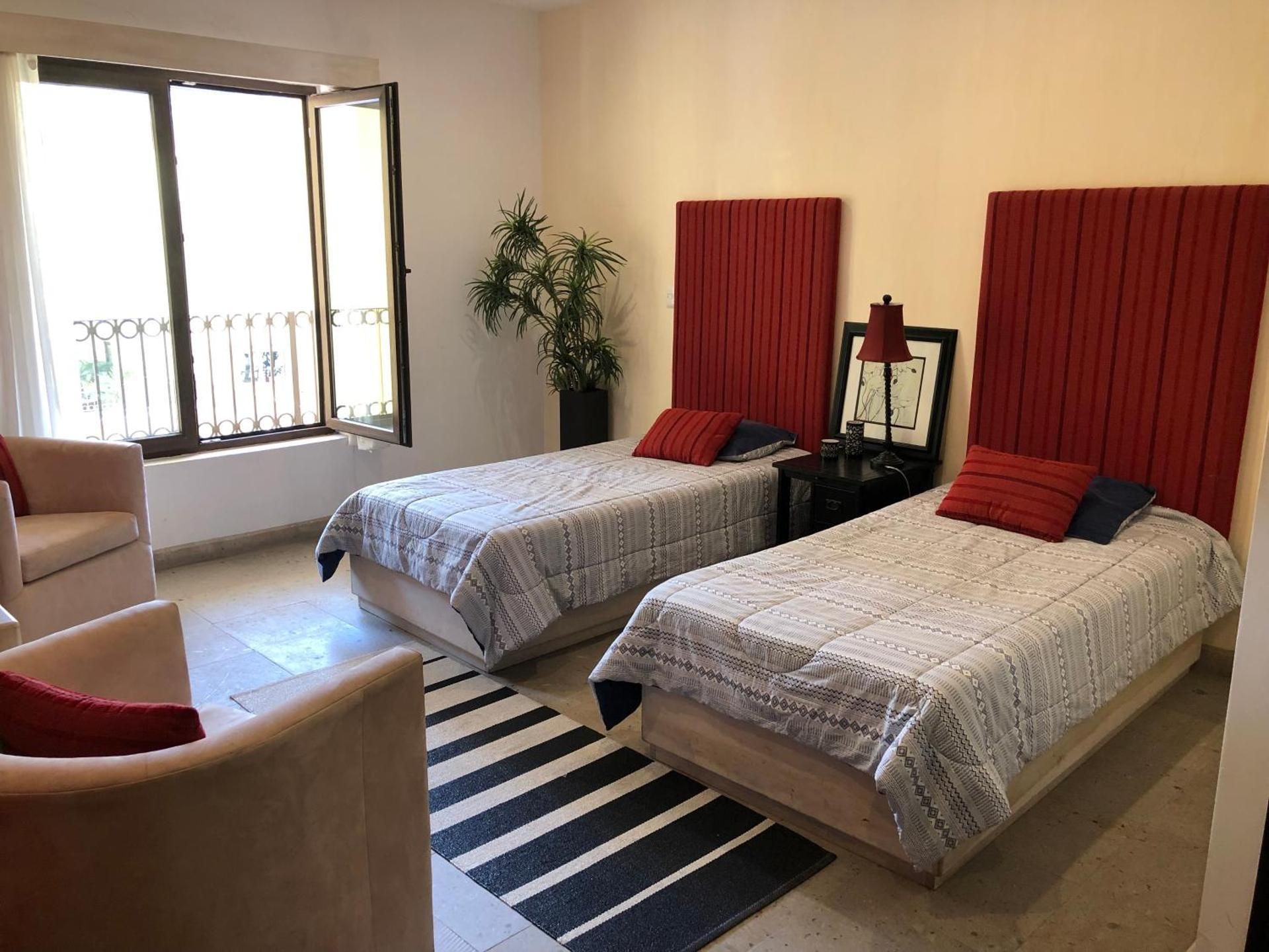 Four-Bedroom Apartment with Balcony 