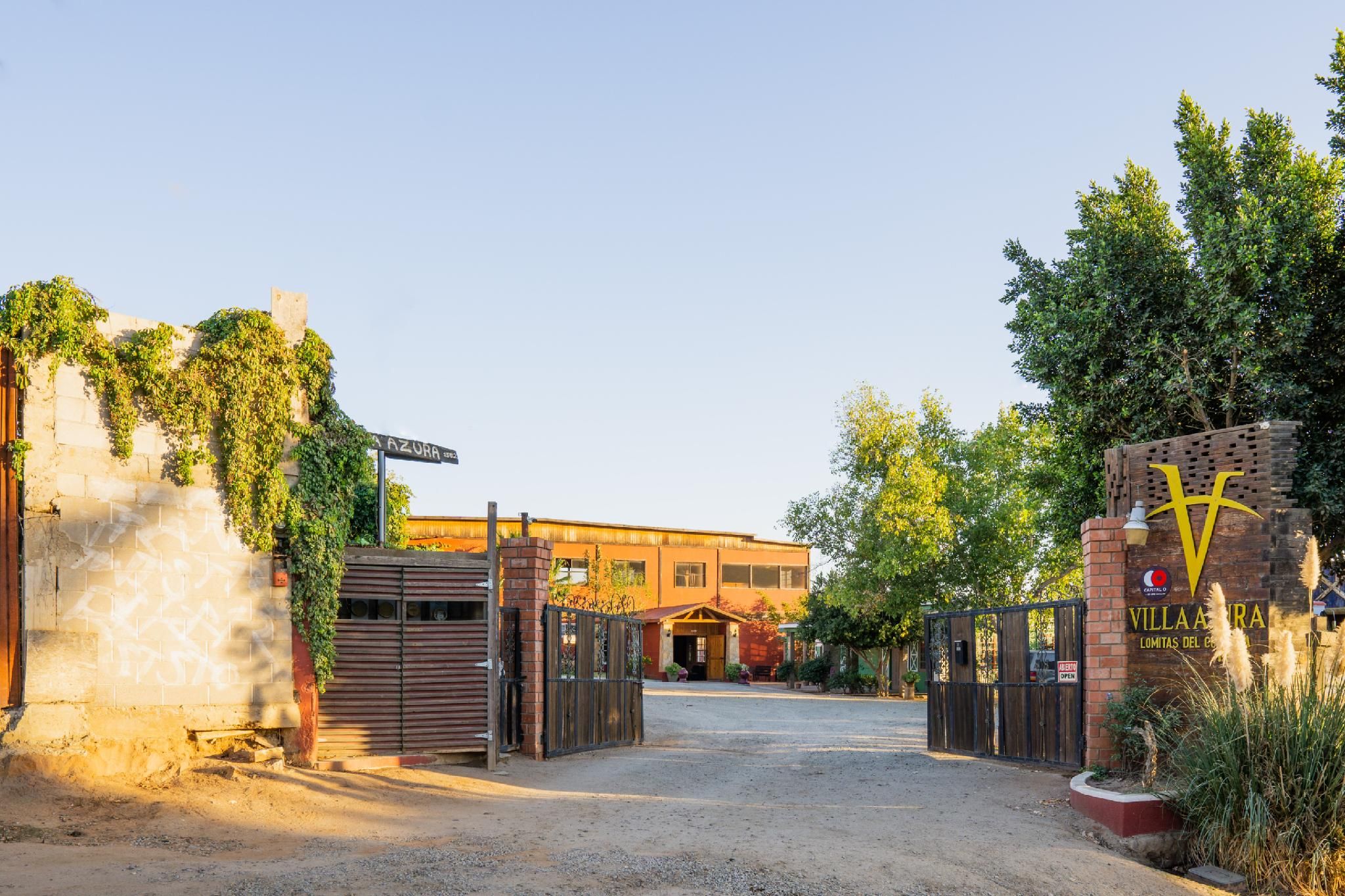 Capital O Hotel Villa Azura